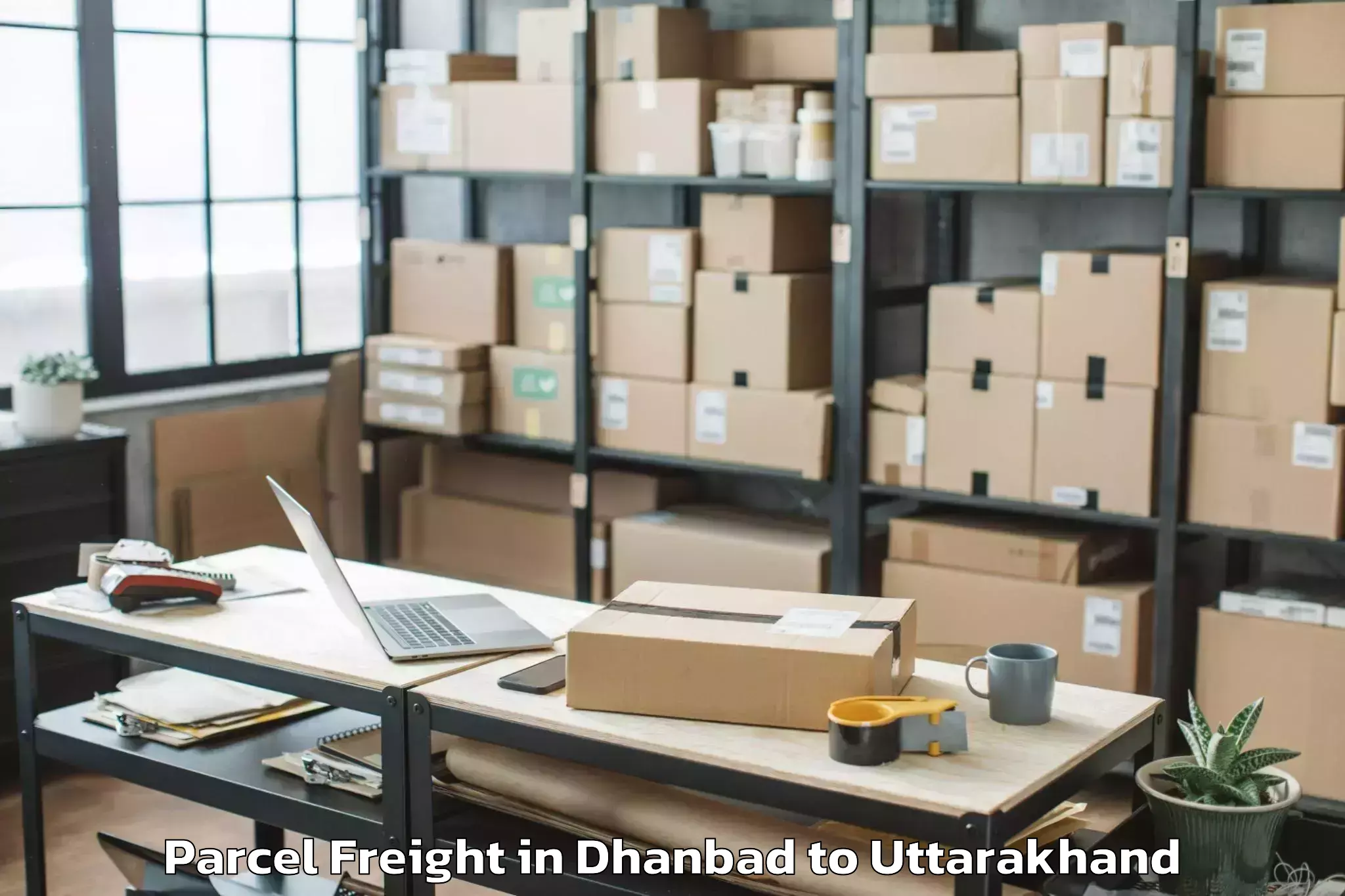 Book Your Dhanbad to Dehra Dun Parcel Freight Today